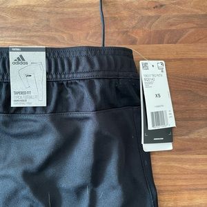 Grey striped Adidas Pants